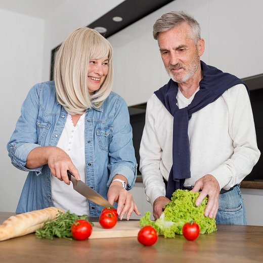 medium-shot-couple-cooking-together